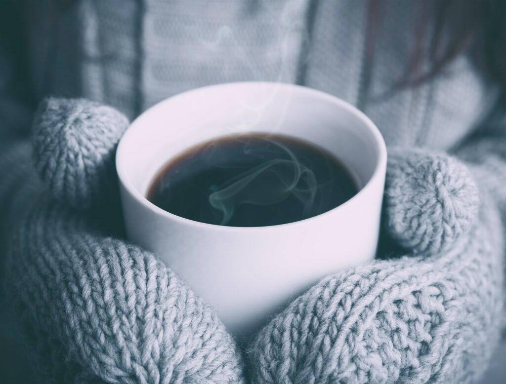 Koffie koud handschoenen achtergrond